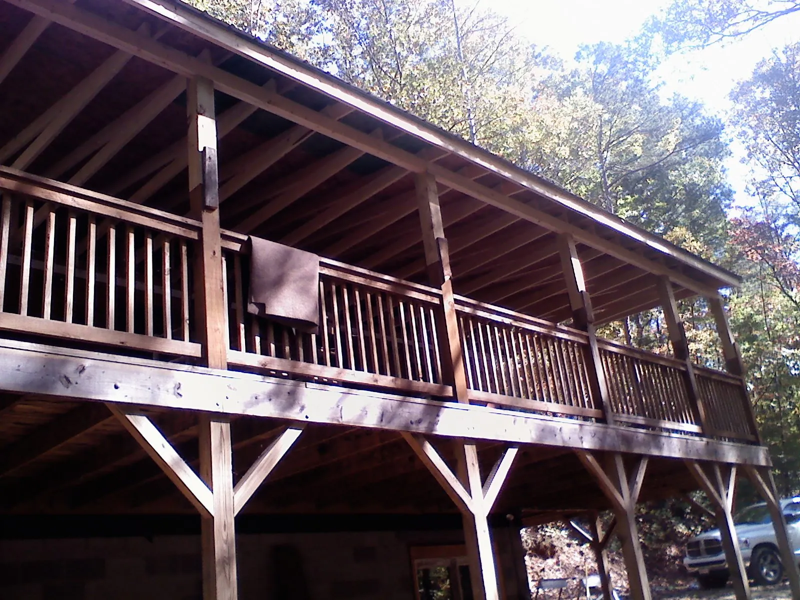 Timber framing under a new elevated porch and deck — Roof Leak Repair in Louviers by Roofing Brothers